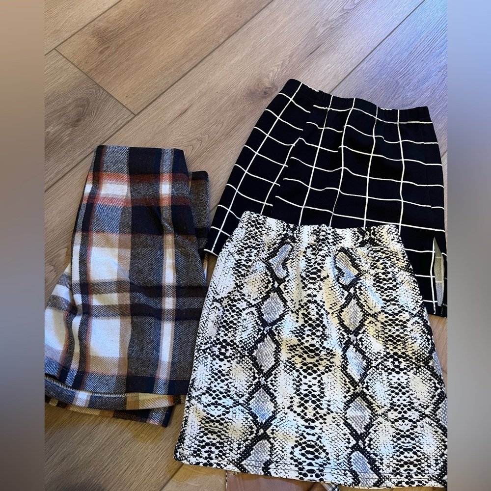 Stylish Skirt Trio - Plaid, Grid, and Snake Print